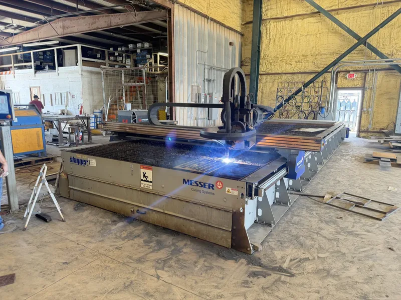 Messer CNC plasma table cutting stainless plate to size